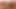 Seksi genç kız tıraşlı amcığını büyük bir dildoyla sikerken eğleniyor
