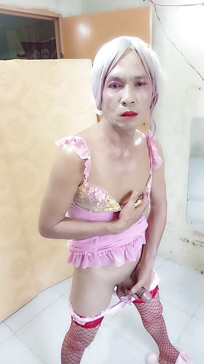 Oanh Le transgender wearing sexy and pornographic clothes standing and screaming is extremely happy
