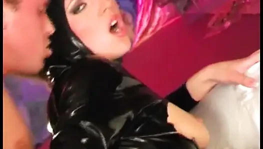 Sex addict in fetish latex dress rides a big cock