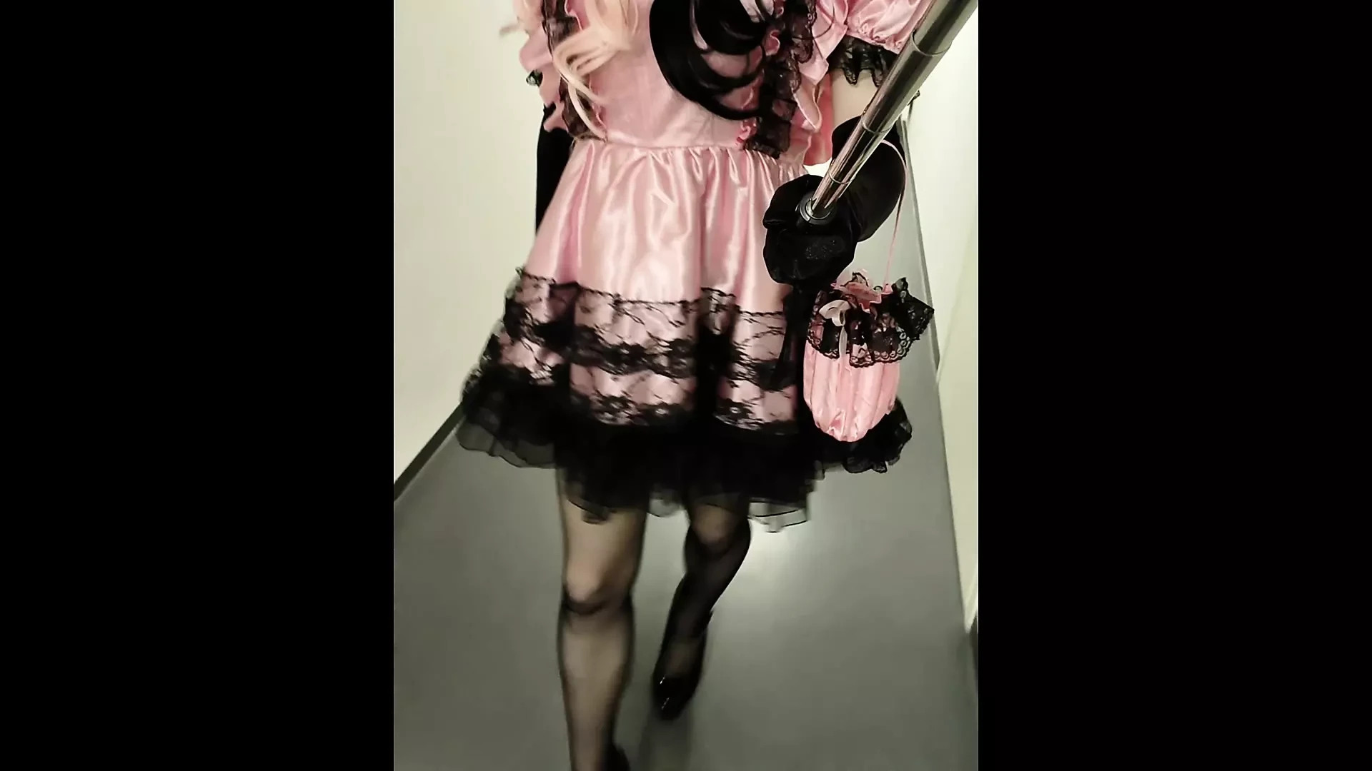 Sissy crossdresser strolling in high heels and flashing