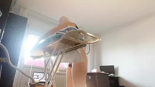 Sexy woman doing naked housework. Brunette, hairy pussy, big ass, big tits. Sexy mom massages herself with a vibrator.