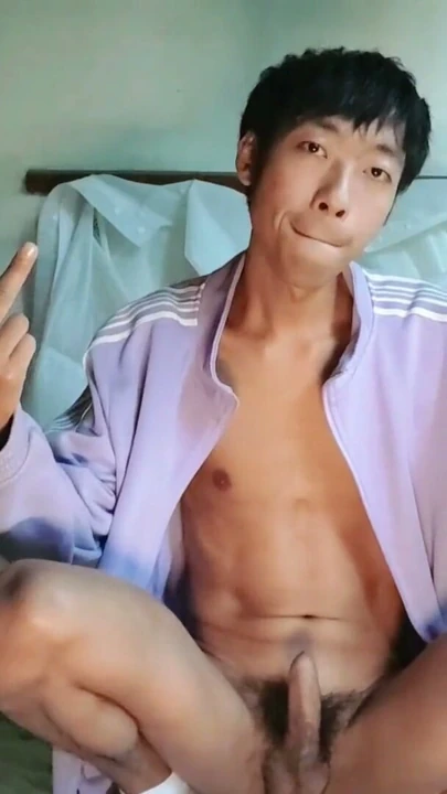 Cute Asian boy masturbates, moans, cums and eats cum on the small bed in the old factory duty room | Clip 1