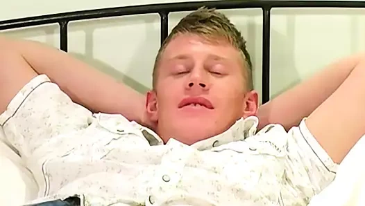 Blond British jock Michael B jerks off his dick and cums