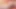 Pirsingli meme uçlu orta yaşlı seksi kadın çıplak yatarken minyon göğüsleriyle oynuyor