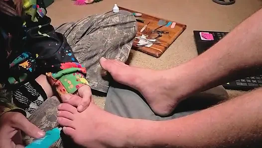 Praising her Masters' feet