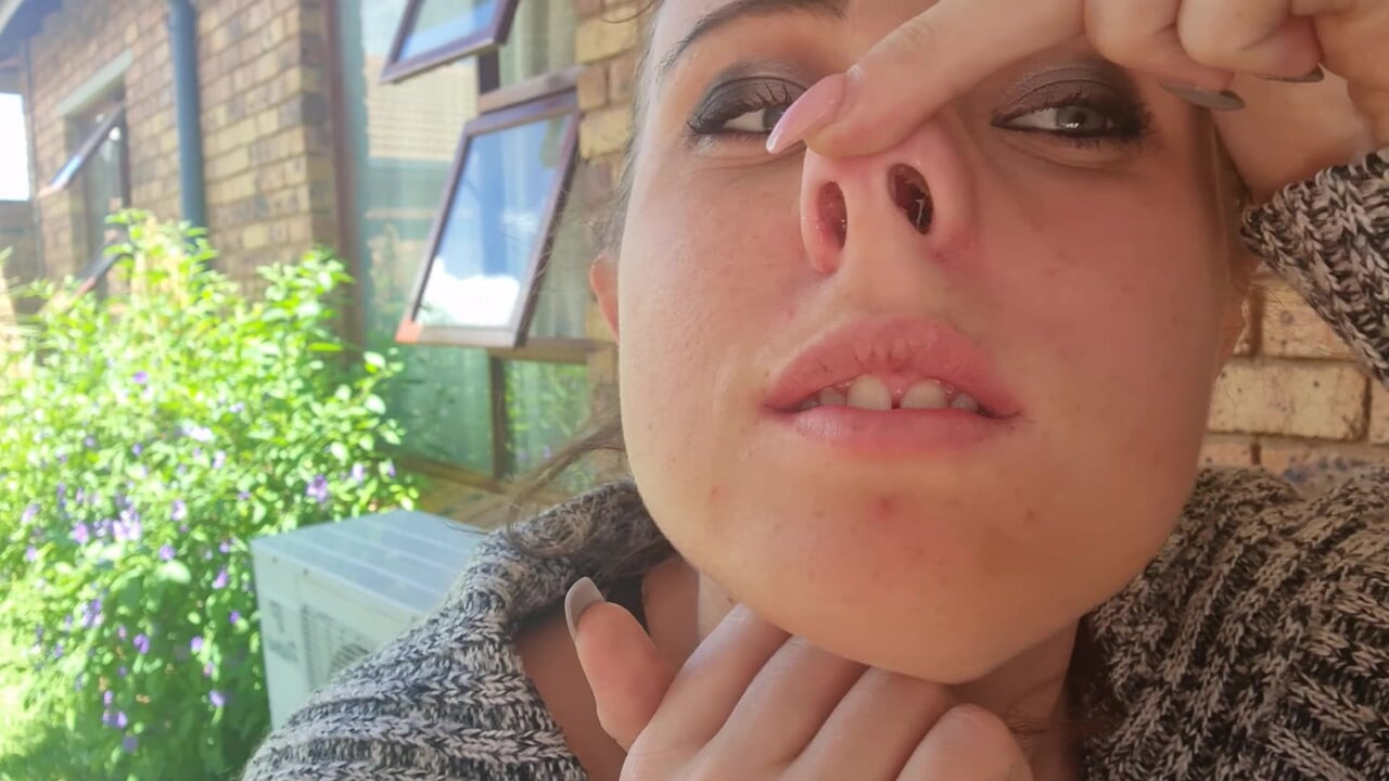 Picking my nose, blowing it and putting the boogers in my mouth to eat them.