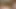 Sarışın yatakta çıplak soyunuyor ve mor dildoyla mastürbasyon yapıyor