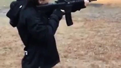 Rachel Starr fires a weapon