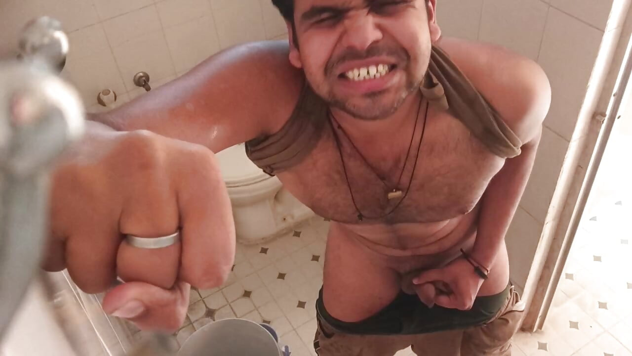 A indian boy was peeing hard in her toilet