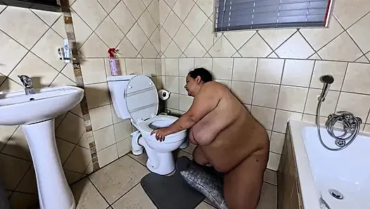 Playing with my fat pussy while licking the toilet