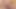 Kızıl saçlı ladyboy renkli bornoz içinde küçük horoz alır