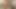 Sarışın orta yaşlı seksi kadın Sophie May mutfakta amını parmaklıyor