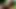Vollbusige Blondine masturbiert mit grünem Toy