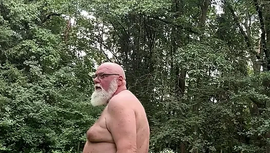 Ralf, the fat, deviant perverted gay bastard, jerks off naked in public in a cemetery and squirts.