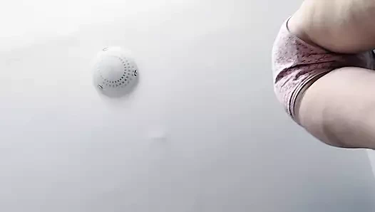 Amateur wife has fun trying on clothes and cutting them.