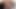 İki seksi genç lezbiyen büyük bir yarakla oynuyor ve sikişiyor