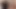 Miley Cyrus yarı giyinikken dans ediyor ve dudaklarını oynatıyor