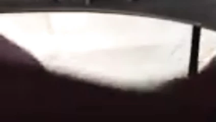 en el asiento de atras