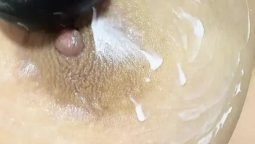 Mom vibrates her big tits with her big vibrator