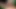 Vollbusige Blondine masturbiert mit grünem Toy