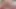Büyük yaraklı travesti Nina Lins kırmızı iç çamaşırını çıkarıyor ve