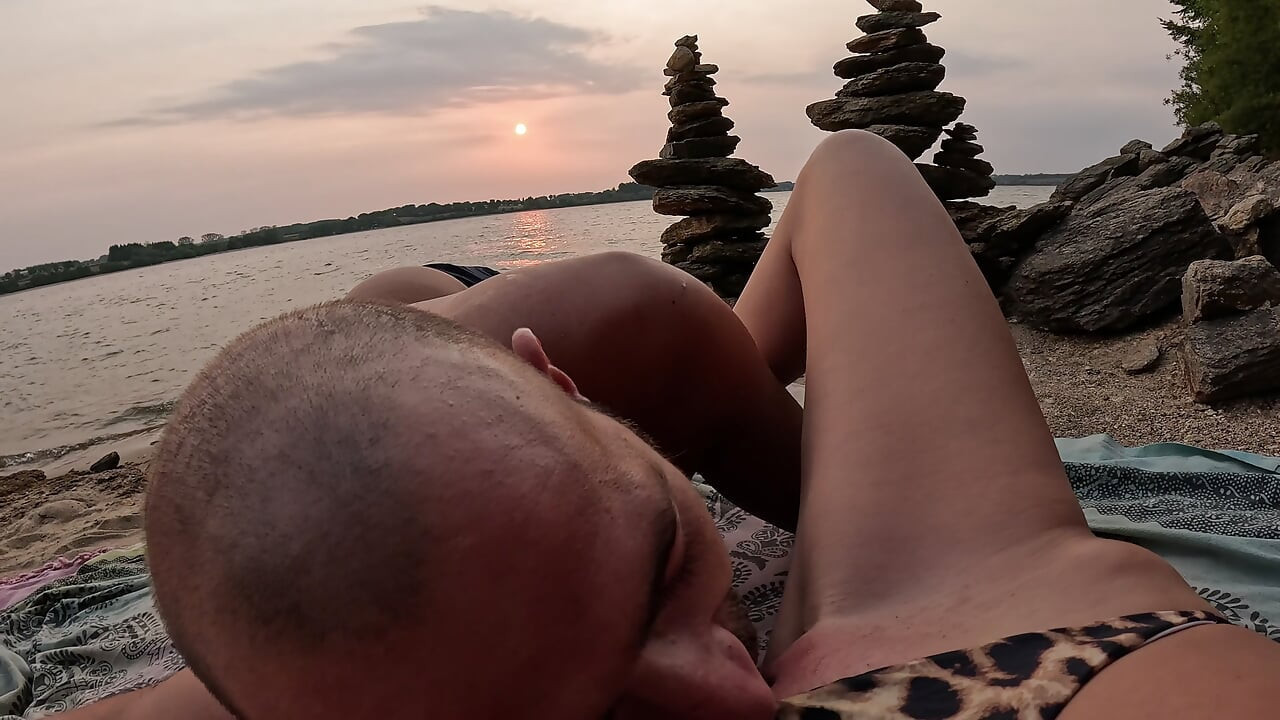 Exhibitionist couple on a French beach enjoys the sunset - Alma Sol squirts repeatedly in public