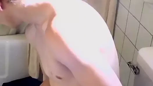 Cigar smoker jerks off in the bathroom and cums solo