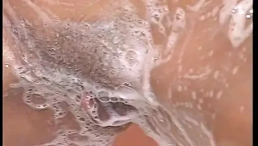 Hairy MILF slut masturbates under shower