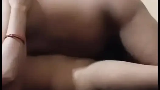 Husband and wife have a fun video in the bedroom.