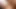 Şımarık göğüslü travesti, iri parçanın horozunda otururken aletiyle oynuyor
