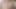 Seksi eğlenceli hippi piliç rachel wriggler ile göğüs boogie göğüslerini müzikle zamanında sallarken egzersiz bisikleti üzerinde