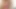Blonde Schoenheit in Rot masturbiert leidenschaftlich