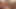 Seksi kaltak iki büyük yarağa ateşli bir elle muamele çekiyor ve ağzına boşalıyor