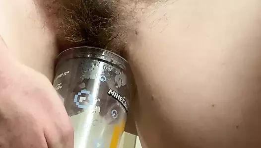 Desperate MILF rushes back to hotel to do HUGE piss in a plastic cup! After filling it once, she strips naked to finish it off
