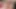 Seksi esmer vibratörüyle yatağında mastürbasyon yapıyor
