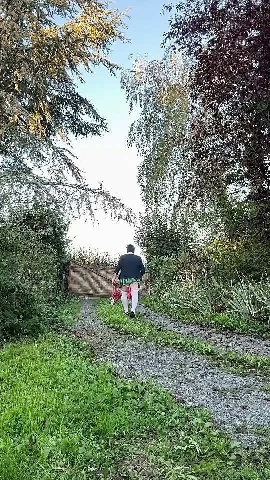 Dressed in a little plaid pleated skirt for a night out