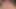 Deri kıyafetli koyu saçlı dominatrix, kölesinin büyük kayışına binmenin tadını çıkarmasına izin veriyor