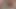 Uzun saçlarını salıyor ve çıplak olarak yıkıyor ve duruluyor.
