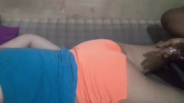 A Woman's Wedding Dress With A Shaved Headband