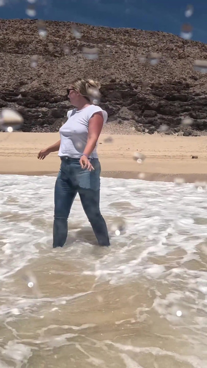 Girl Wetting Jeans in the Ocean and Swimming in Wet White T-shirt