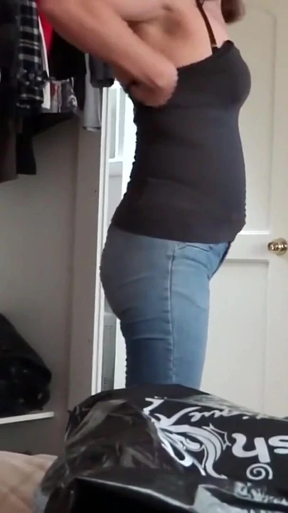 My stepmother tries on jeans while I masturbate, admiring her big ass and hairy pussy. | Clip 1