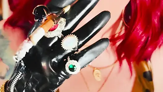 The Beautiful Rubber Beauty Tina Snua Smoking A Cigarette Using A Holder - Smoker Latex Gloves Rings Jewellery