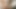 Junge Latina 23 Jahre steht auf grosse weisse Schwaenze zum melken