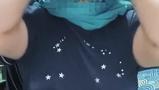 Blue hijab Muslim woman with seductive black t-shirt