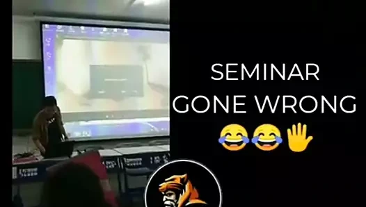 Seminerde porno oynadı