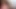 Pembe deri koşum takımındaki seksi iri güzel kadın