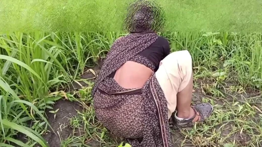 The desi daughter-in-law of the village is taking off her clothes in the millet field and showing her finger in her pussy to her father-in-law.