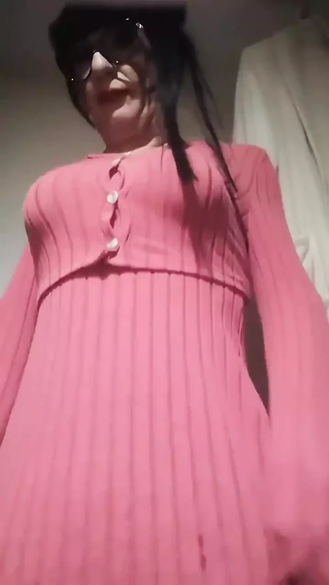 Effeminate Boy Dressed As A Woman In Front Of The Mirror