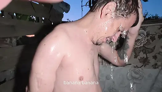 Soapy naked bodies in a rural shower