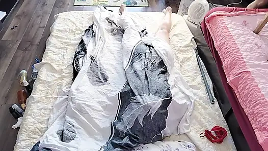 Sensual massage of a hot couple with oil on the body.